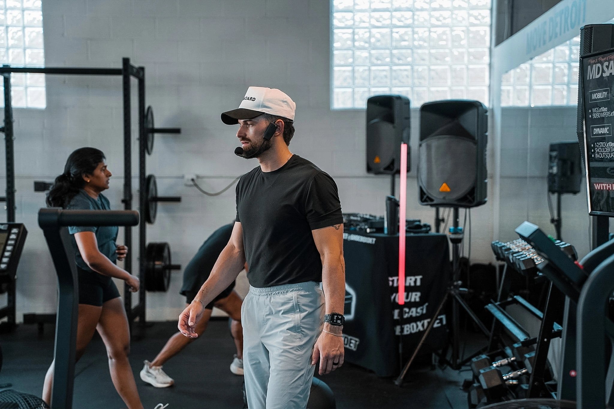 Logan Gray coaching on the floor at Move Detroit