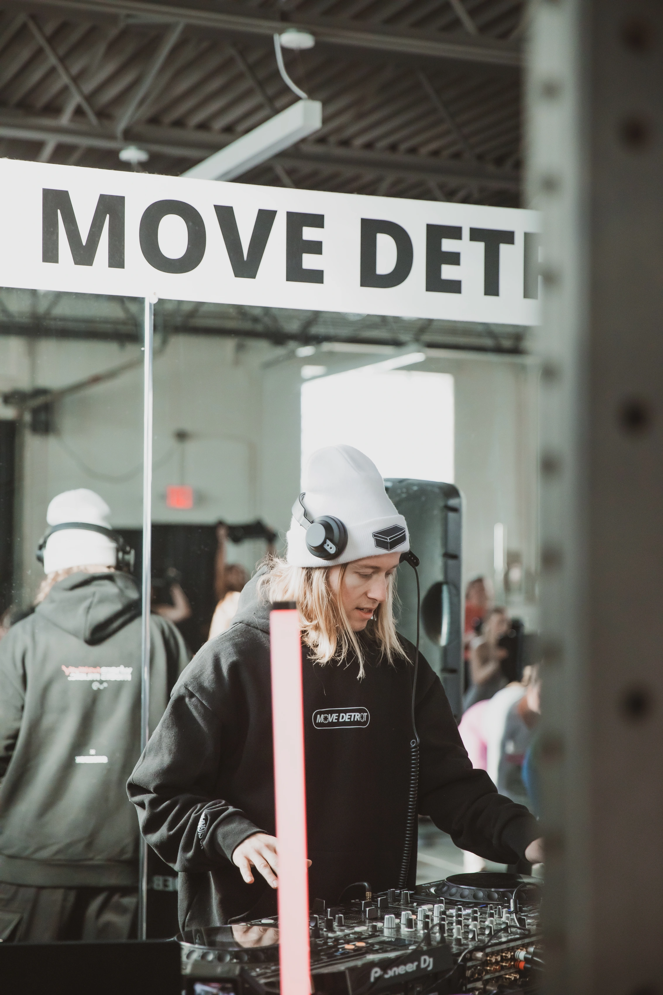 DJ at the decks during a Move Detroit class